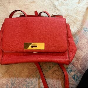 Chic Orange Shoulder Bag with Gold Accent